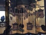 Huge folding carved wood oriental screen.