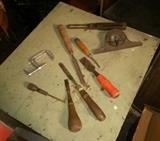 Vintage wood working tools, many hand tools, shelving and brackets, folding chairs, assorted garage items, compressor, lawn and garden tools, and much more. 