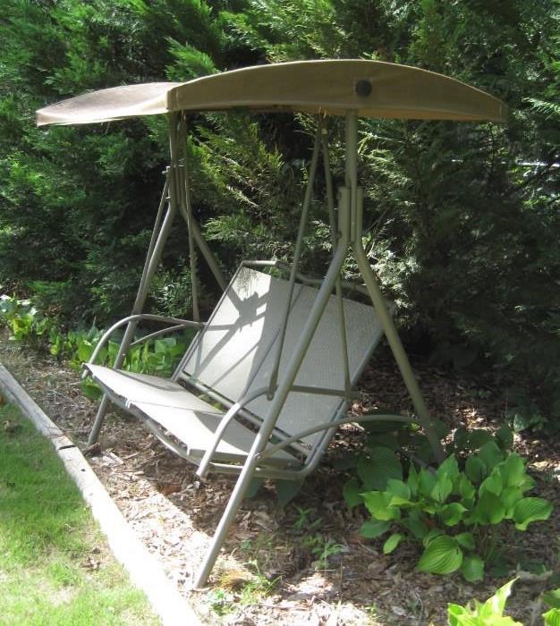 Outdoor swing with marine awning top