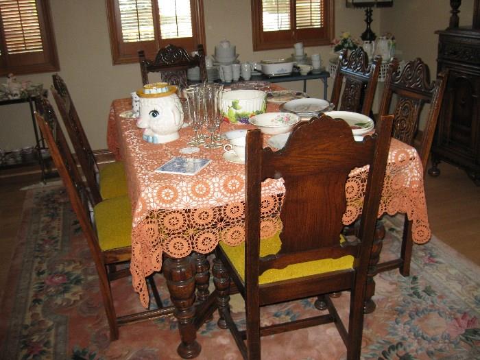 Jacobean Dining room set, table extends to 8 foot. 6 chairs, 