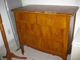small wood chest of drawers.