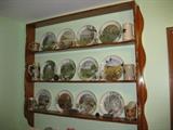 decorator plates, steins and shelf.