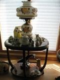 oval table with GWTW lamp and cat collection.