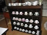 Nice old book case and more cups and saucers