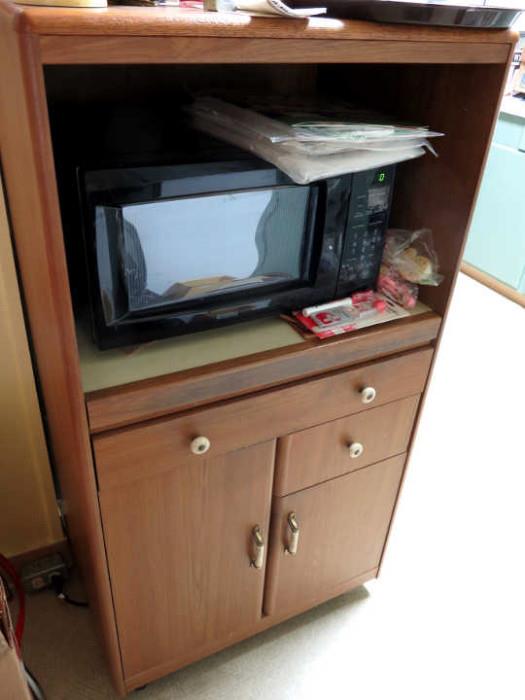 Small microwave cabinet and microwave