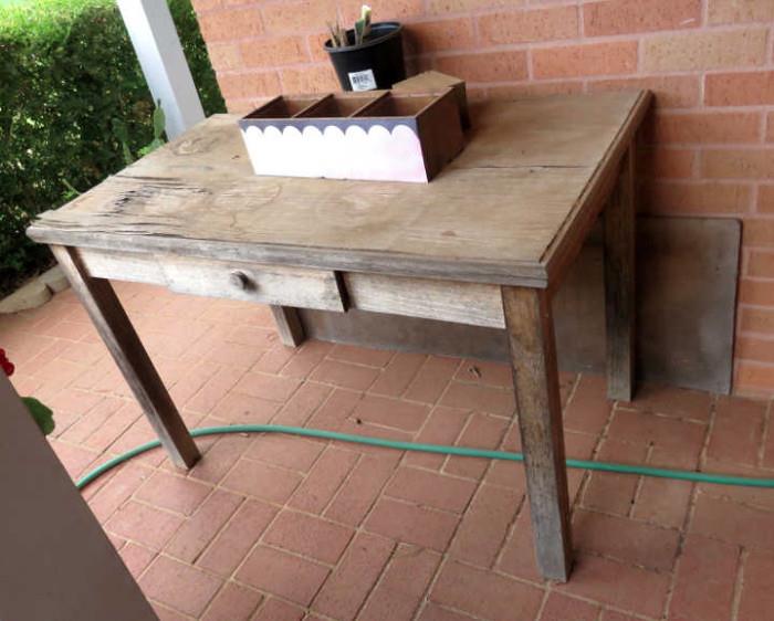 Wooden table with one drawer