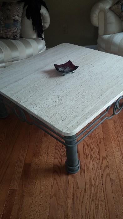Marble coffee table with wrought iron base. Table is 42" x 42", 1 and 1/2 inch thick. $250.00