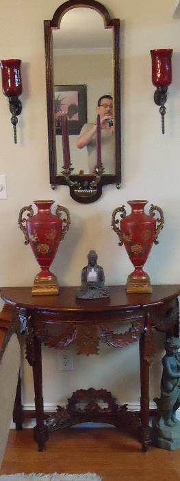 Beautiful carved table  urns  mirror  wall sconces