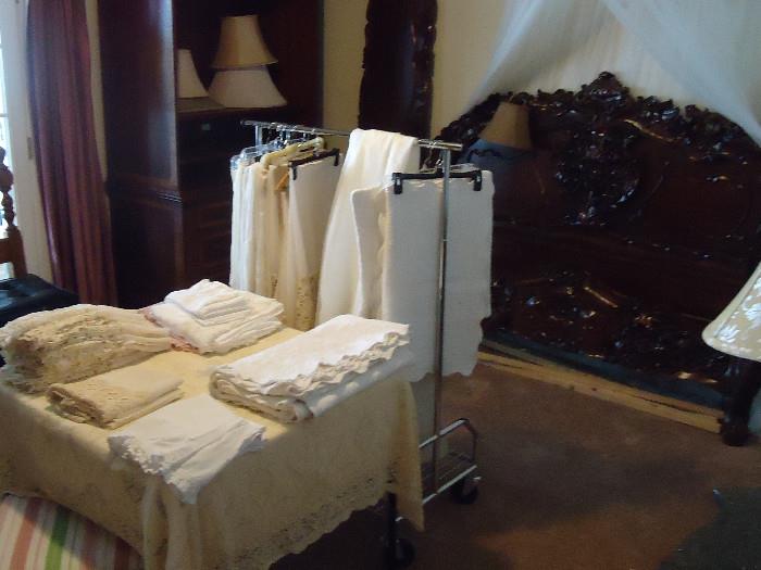 Curtains and bed linens  carved bed