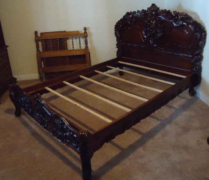 Carved mahogany bed