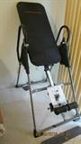 Back exerciser where you hang unside down for pain relief
