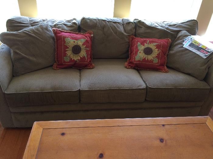 High end Lovely and comfortable relaxing couch with several accent pillows