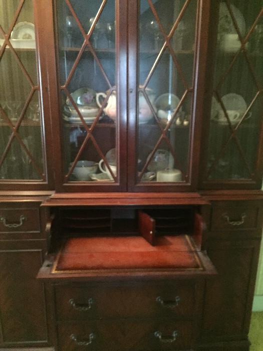 Antique secretary, contents of cabinet may vary based on inventory. 