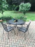 Round (48 inch) patio table with 4 arm chairs