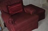 One of a pair of very nice upholstered chairs in a burgundy pattern; matching ottoman.