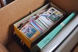 Large collection of baseball trading cards.