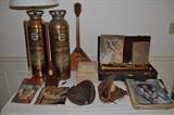 Two fire extinguishers, one has been converted to a lamp, antique Russian Balalaika, trumpet in case, old catcher's mitt, baseball glove, sheet music, music books, 1910 and up National Geographic magazines, metronome.