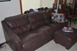 Leather sofa with matching ottoman, "fit" baseball caps, patchwork pillows, vanity with chair, rush seat.