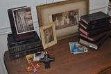 Several bibles, framed photo from early 1900s, post cards.