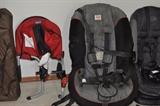 Miscellaneous baby items including stroller, backpack baby carrier, car seats.