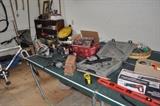 Trek men's bicycle, ping pong table, Porter Cable nail gun, garden tools, automotive supplies, saw, and more.