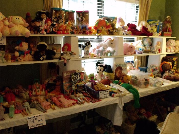 Lots of stuffed animals, Barbies, 90210 dolls and other toys.