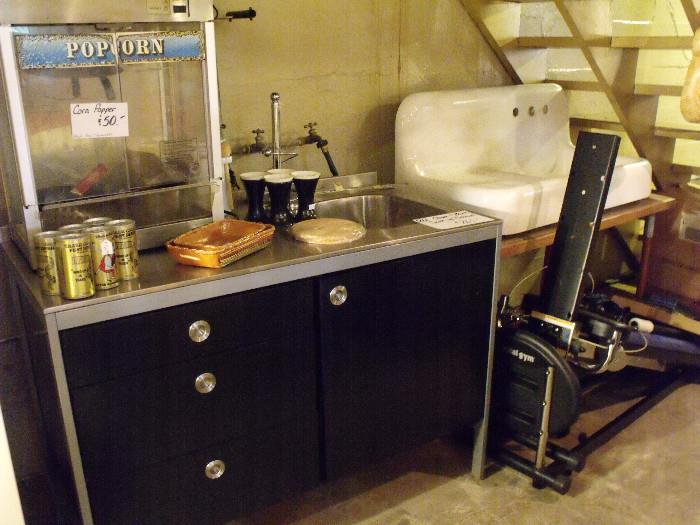 IKEA chrome and black sink w/cabinet, popcorn machine and other items.