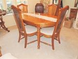 Thomasville Dining room suite with leaf, 6 chairs and coordinating china curio