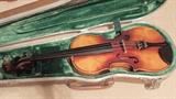 Vintage child's violin in case