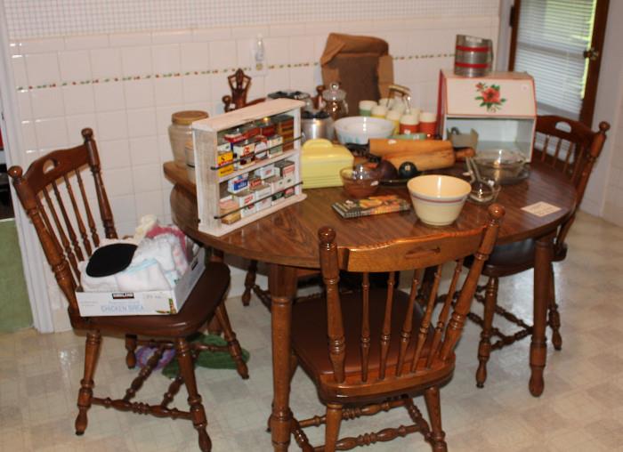 Kitchen table with four chairs and vintage kitchen items