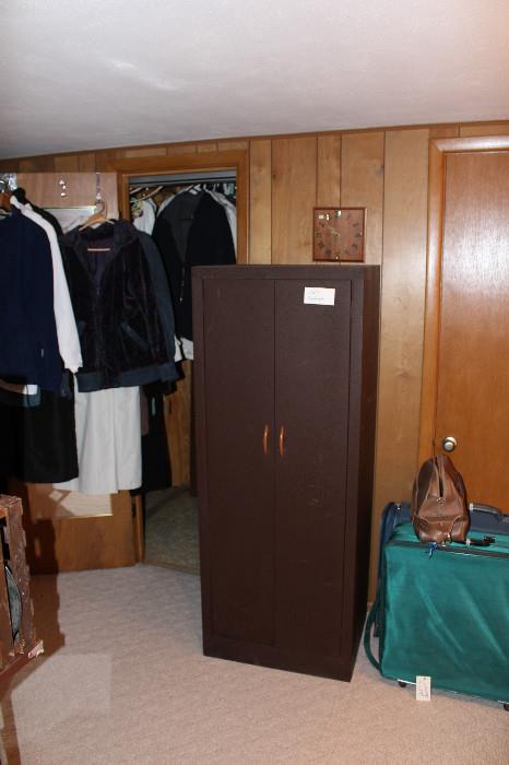metal cabinet, misc clothes, luggage