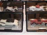 Some of the cars are in cases.