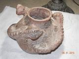 Stunning antique terra cotta water jug surrounded by three serpents.  This is a must see!