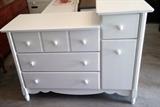 Dresser / Changing Table w/ 4 Drawers & 1 Cabinet 
Color - White
3 Drawer Area Dimensions - 35"L x 19"D x 35"H
1 Drawer + 1 Cabinet Area Dimensions - 16 3/4"L x 19"D x 39 1/2"H