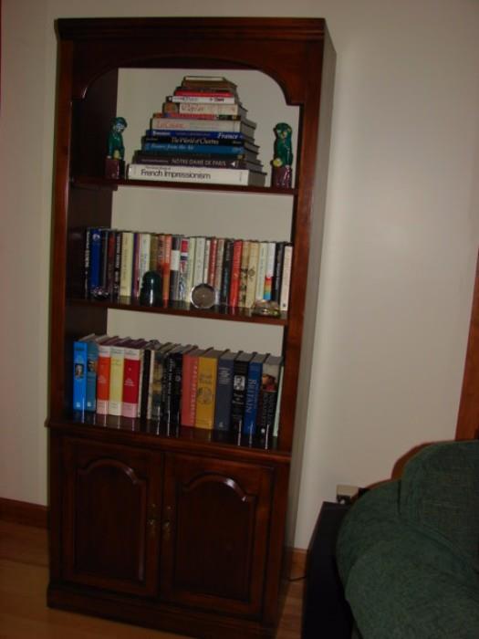 Wood book shelf with cabinet base.