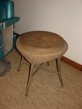 Primitive handmade wicker with wood stool.