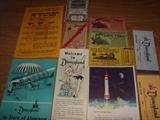 Walt Disney collection of old hat pins, tickets, Pamphlets, post cards and Maps.
