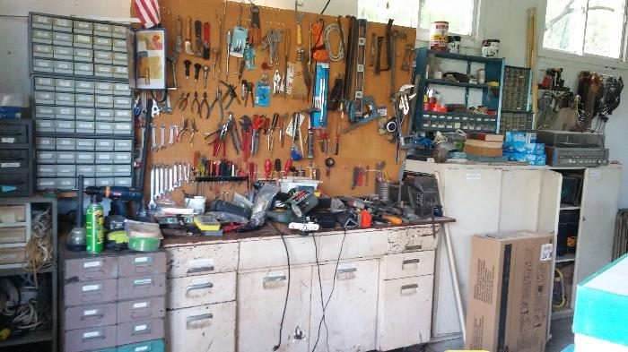 One section of the many tool areas, there is a craftsman table saw, delta 10" miter saw and a whole lot more we haven't even inventoried what is inside cabinets yet