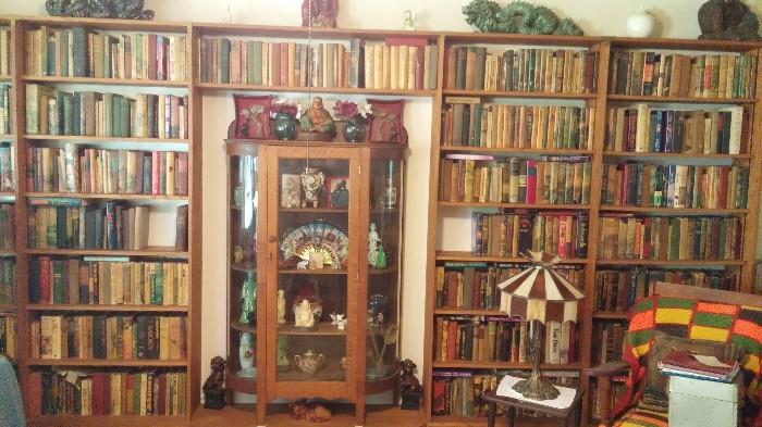 Curio cabine, and the mega book wall, shelves for sale too, mid century