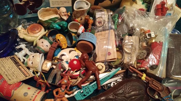 Look at all of the smalls starting to accumulate ... lead cowboys and indians, letter openers, old Mickey Mouse, advertising, tin litho wind up chick in egg, this is just a small portion of the smalls