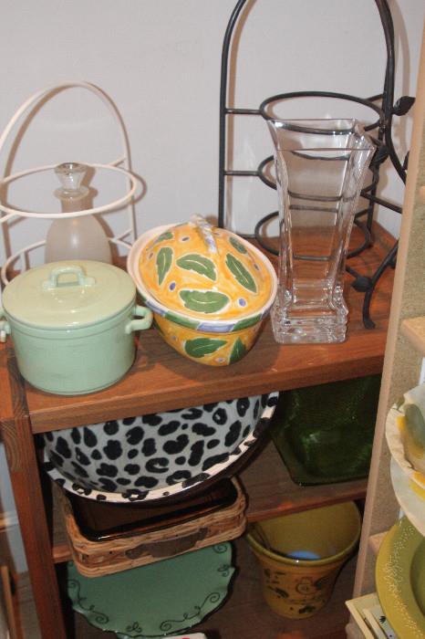Kitchenware, platters and covered cookware.