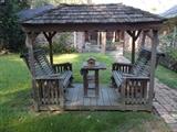 Covered Double Gliders with Middle Table & Floor...almost like a GAZEBO!!!!  Will take MANY strong people to move this!!!!!!!!!  Great addition to ANY back yard!!!!!!!!!