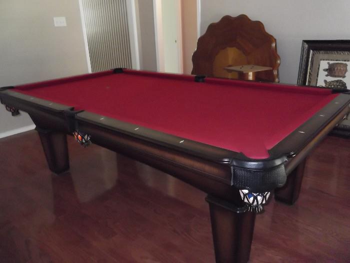 Olhausen "Grace" pool table 8'  Maple wood w/ Mahogany finish. Pearlized diamond sights, black leather fringe pockets, 3/4" slate, accu-fasst cushions, pro-grade. Includes belgain balls, 4 cues and rack.  Buyer responsible for disassemble and moving. Will pre-sell call at 817-507-7757 for appt. 