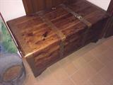 Vintage wood trunk with brass straps