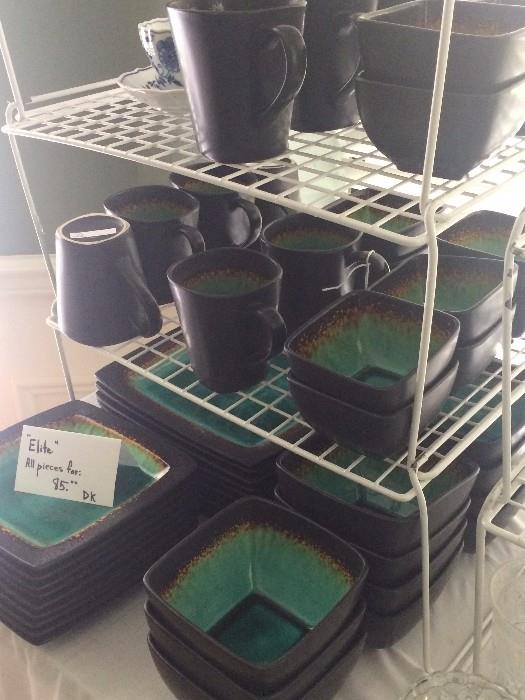 "Elite" greenish-aqua and dark brown brown pottery