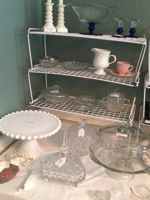 Assorted cake stands and crystal pieces