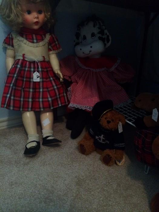 Several dolls & stuffed animals