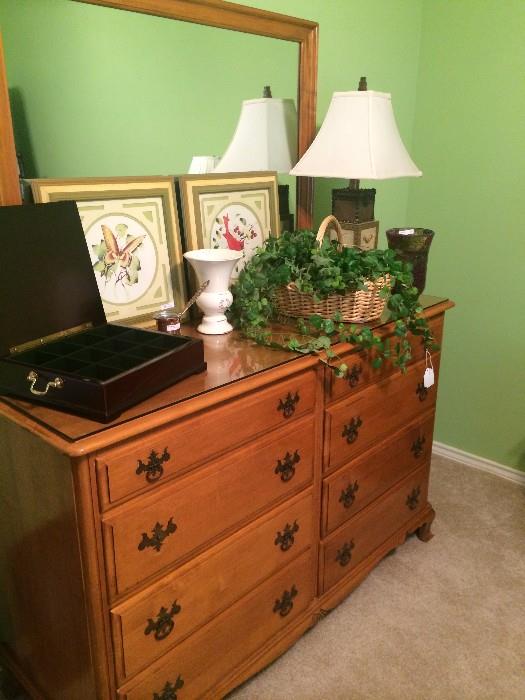 Eight drawer dresser & mirror has matching nightstand.