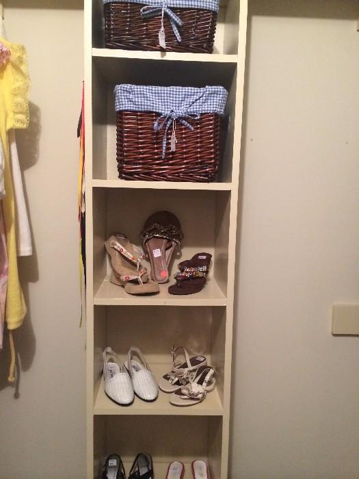 Some of the many shoes; basket organizers