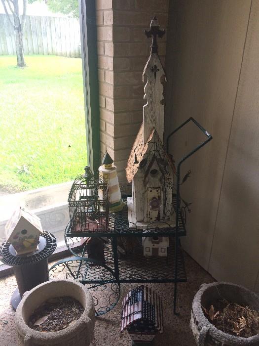 Variety of bird houses; plant pots; metal patio cart